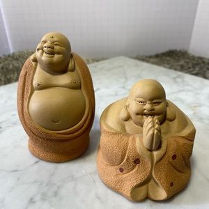 Laughing Buddha’s clay figurines.